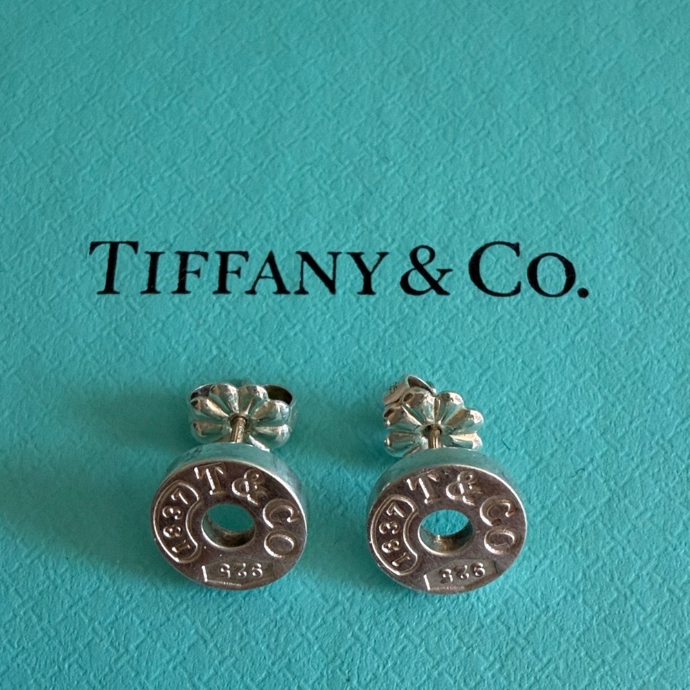 Tiffany & Co. Silver Round Logo Hoop-Style Stud Earrings